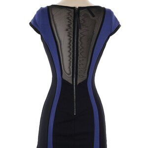 Black mini dress with blue accents, sheer back